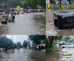 सूरत : शहर में दो घंटे में चार इंच बारिश, घुटने तक पानी में फंसी गाड़ियां